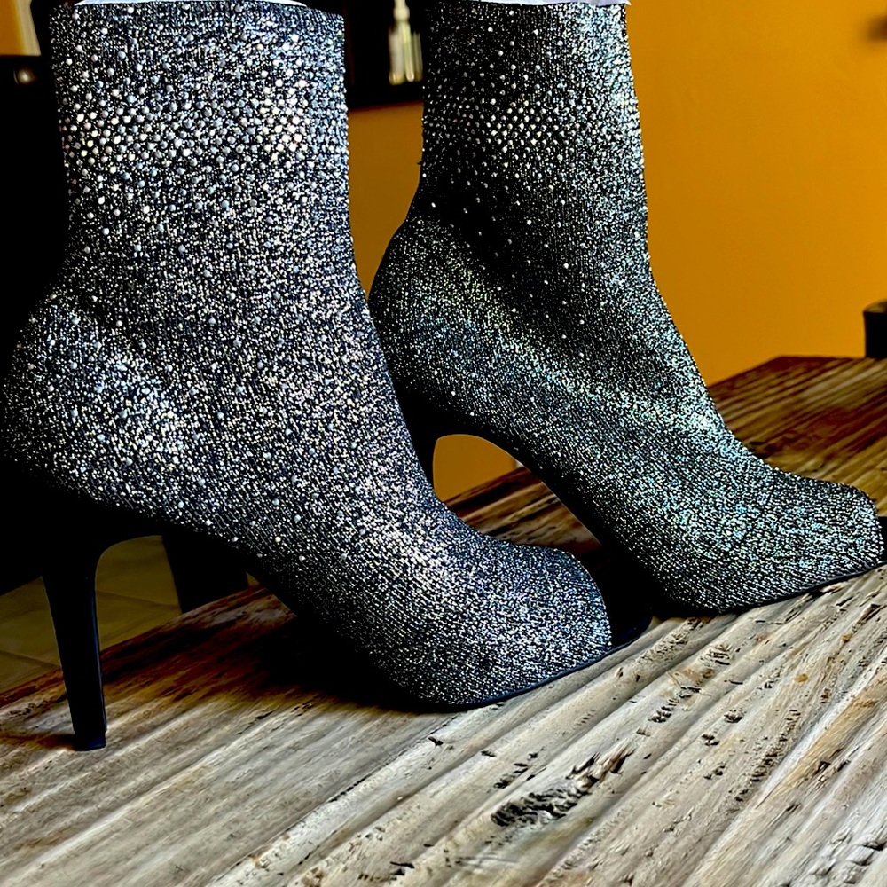 Stretchy silver boots size 5.5